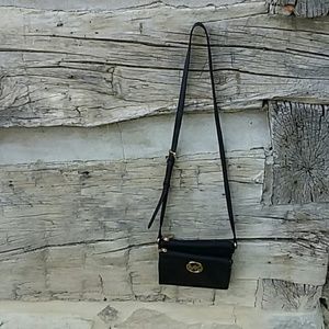 Authentic Michael Kors Black leather purse.
